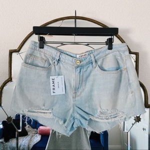 FRAME Denim light wash distressed shorts (NWT)